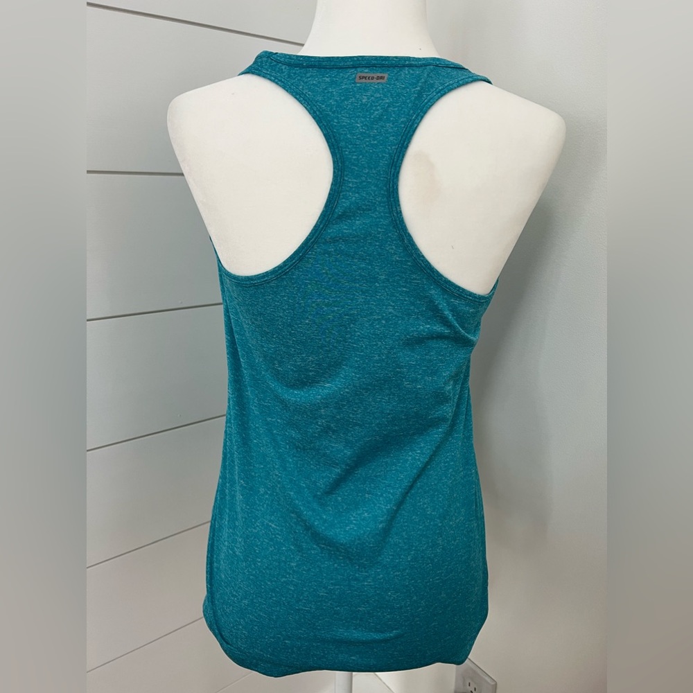 Spaulding ladies aqua blue size medium workout shirt. EUC